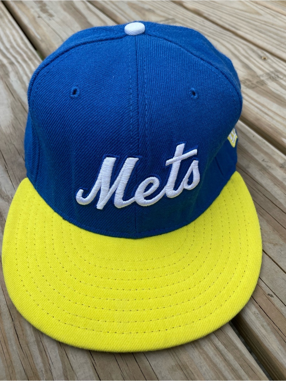 New Era Blue and Yellow Mets Script Cap